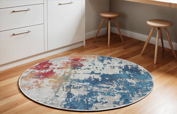 Homeroots 6' Ivory Red And Blue Abstract Distressed Non Skid Round Rug  Polypropylene,Polyester 550933