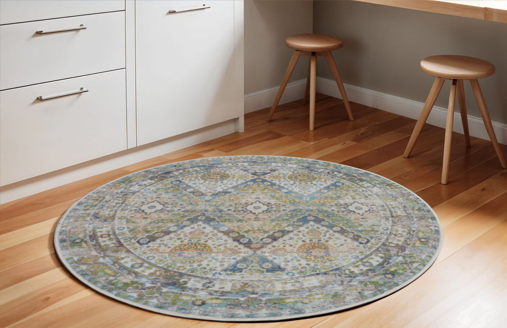 Homeroots 6' Ivory Blue And Green Floral Distressed Non Skid Round Rug  Polypropylene,Polyester 550934