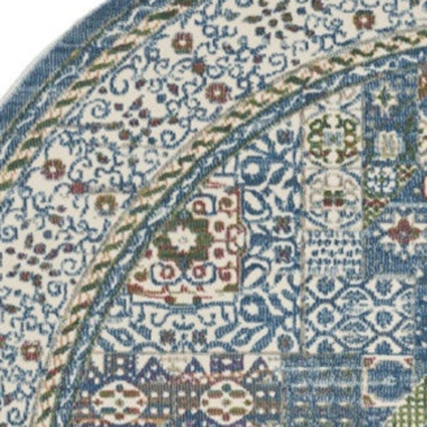 HomeRoots 6' Ivory Blue and Green Bohemian-Inspired Oriental Distressed Rug for Warmth and Style 6' Round 550939