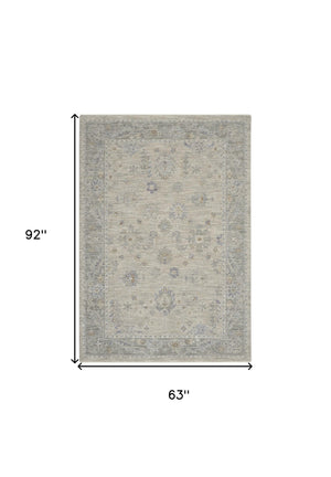 Homeroots 5' X 8' Beige And Gray Floral Power Loom Area Rug  Polypropylene,Polyester 550948