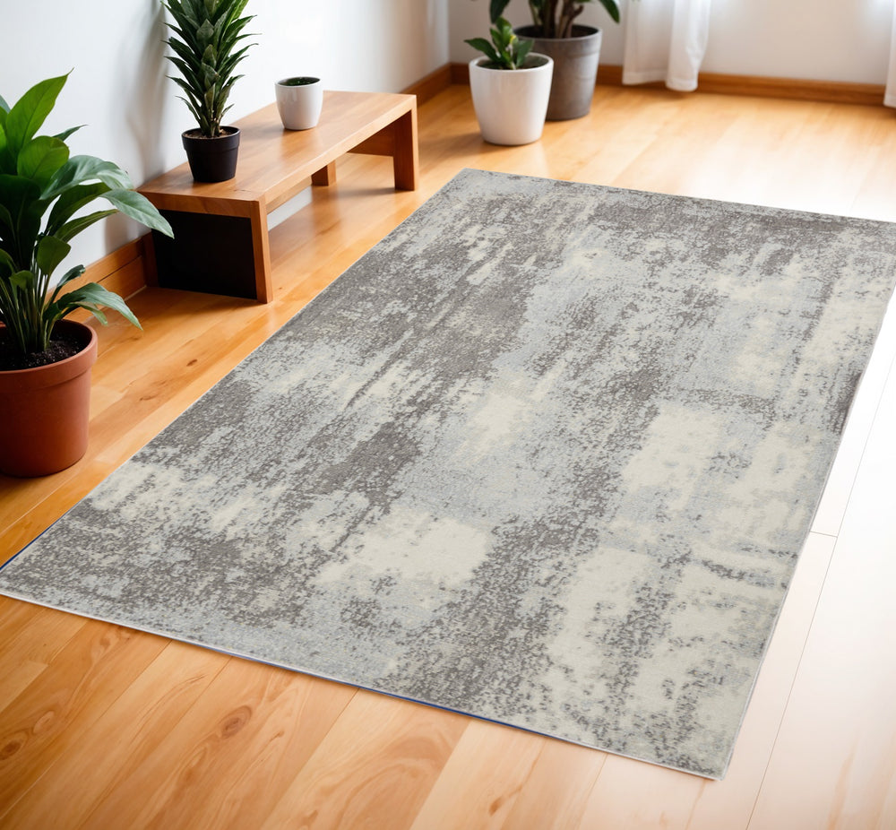 Homeroots 4' X 6' Gray Ivory & Light Blue Abstract Non-skid Area Rug - Durable, Stylish, Perfect For Any Space!  Polypropylene,Polyester 550951