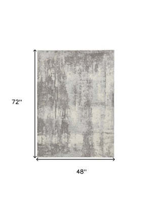 Homeroots 4' X 6' Gray Ivory & Light Blue Abstract Non-skid Area Rug - Durable, Stylish, Perfect For Any Space!  Polypropylene,Polyester 550951