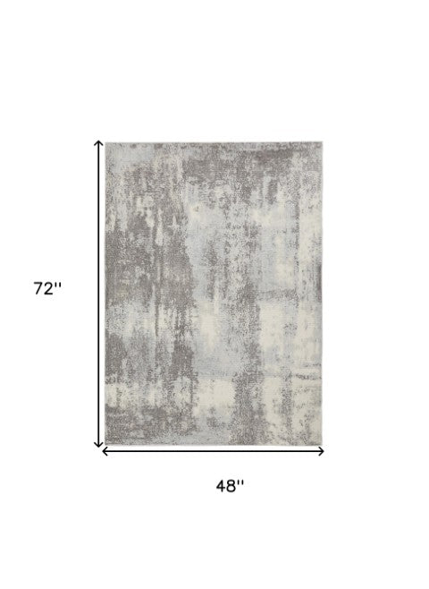 Homeroots 4' X 6' Gray Ivory & Light Blue Abstract Non-skid Area Rug - Durable, Stylish, Perfect For Any Space!  Polypropylene,Polyester 550951