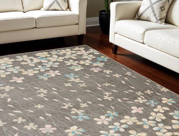 Homeroots 6' X 9' Beige And Gray Floral Area Rug - Stain Resistant, Durable, Perfect For Homes With Kids & Pets  Polypropylene 550955