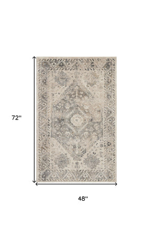 Homeroots 4' X 6' Cream And Gray Medallion Distressed Area Rug  Polypropylene 550965