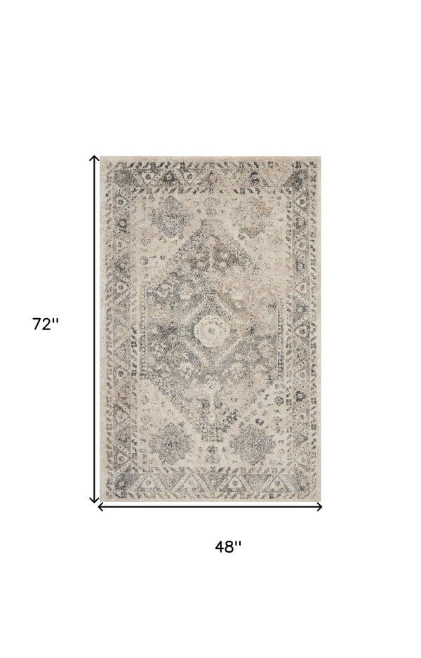Homeroots 4' X 6' Cream And Gray Medallion Distressed Area Rug  Polypropylene 550965