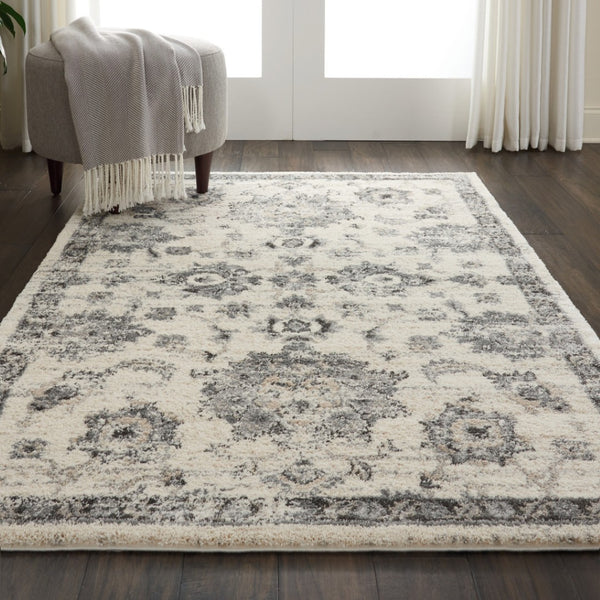 HomeRoots 4' Elegant Cream and Gray Floral Medallion Distressed Area Rug for Timeless Home Décor Appeal 4' X 6' 550966
