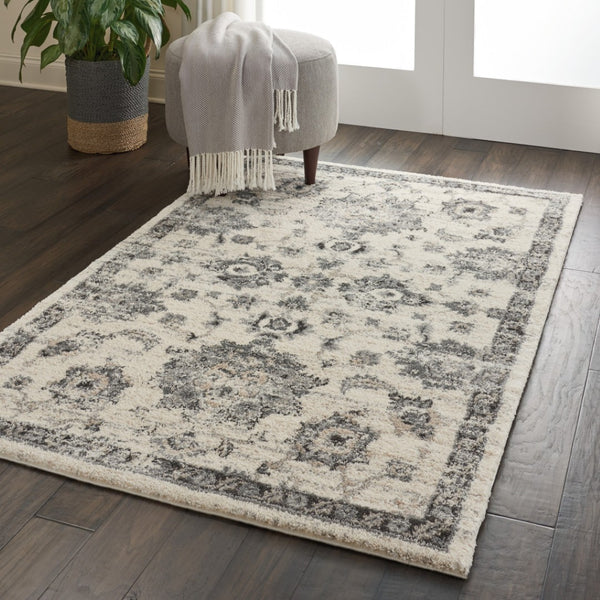 HomeRoots 4' Elegant Cream and Gray Floral Medallion Distressed Area Rug for Timeless Home Décor Appeal 4' X 6' 550966