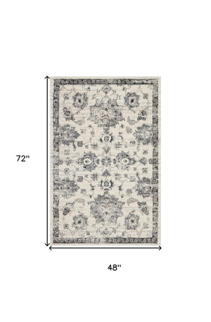Homeroots 4' X 6' Cream And Gray Floral Medallion Distressed Area Rug  Polypropylene 550966