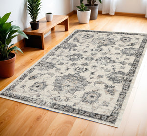 Homeroots 4' X 6' Cream And Gray Floral Medallion Distressed Area Rug  Polypropylene 550966