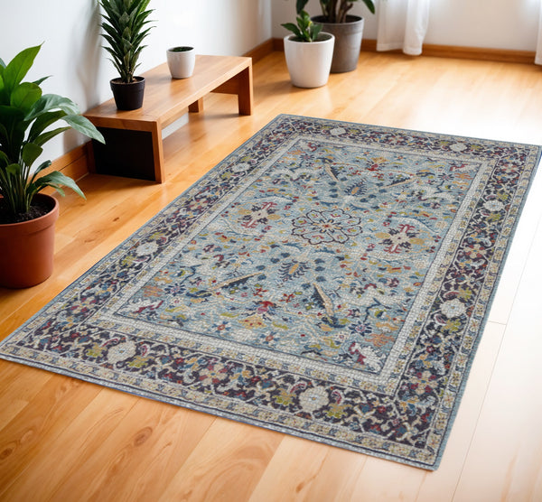Homeroots 4' X 6' Teal Blue Orange And Black Floral Distressed Non Skid Area Rug  Polypropylene,Polyester 550980