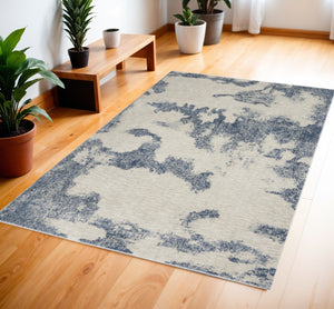 Homeroots 4' X 6' Light Blue And Ivory Abstract Non Skid Area Rug  Polypropylene,Polyester 550984