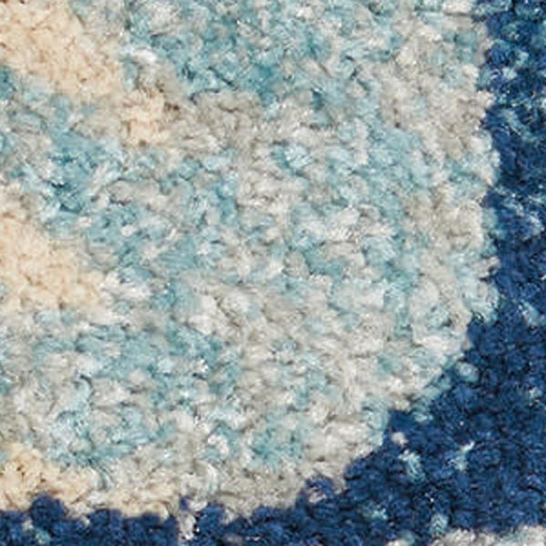 HomeRoots 5' Navy Blue and Beige Botanical Leaves Area Rug for Stylish and Durable Home Decor Solutions 6' X 9' 550990