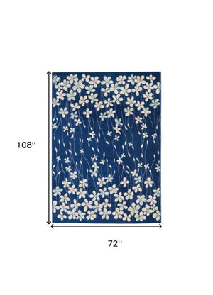 Homeroots 6' Navy Blue And Ivory Floral Area Rug - Durable, Stain Resistant, Ideal For Kids And Pets, 72x108" 6' X 9' Polypropylene 550992