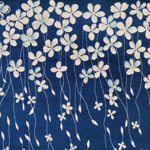 Homeroots 6' Navy Blue And Ivory Floral Area Rug - Durable, Stain Resistant, Ideal For Kids And Pets, 72x108" 6' X 9' Polypropylene 550992