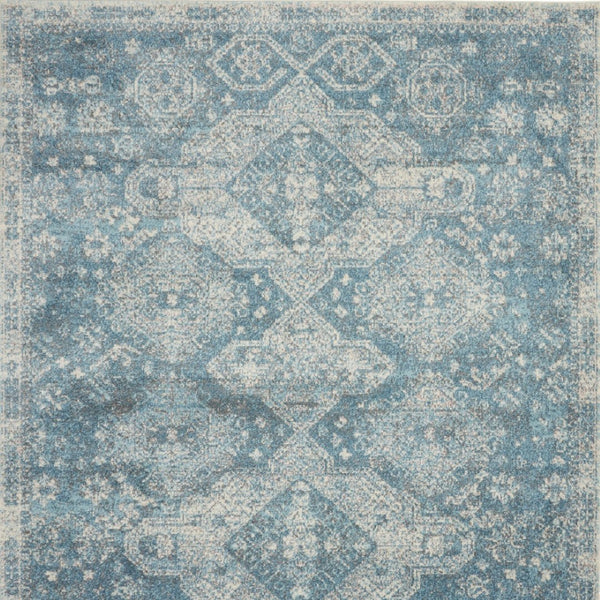 Homeroots 5' Ivory And Light Blue Medallion Distressed Area Rug - Durable, Stain Resistant, Stylish Design 7' X 10' Polypropylene 551036