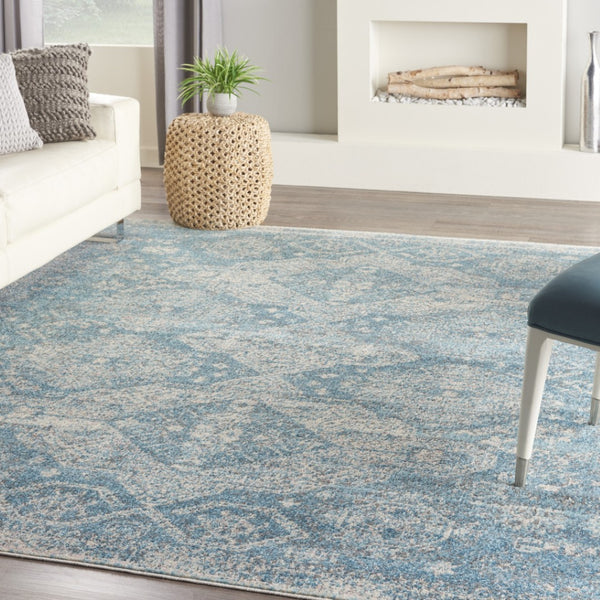 Homeroots 5' Ivory And Light Blue Medallion Distressed Area Rug - Durable, Stain Resistant, Stylish Design 7' X 10' Polypropylene 551036