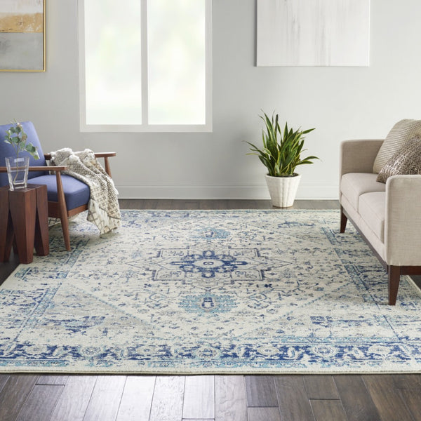 HomeRoots 7' Ivory and Light Blue Floral Medallion Distressed Area Rug - Durable, Elegant, and Versatile Design 551039