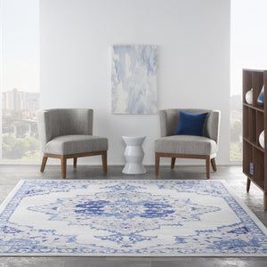 HomeRoots 7' Distressed Floral Medallion Area Rug in Ivory and Blue – Stain-Resistant, Non-Skid Comfort 8' X 10' 551043
