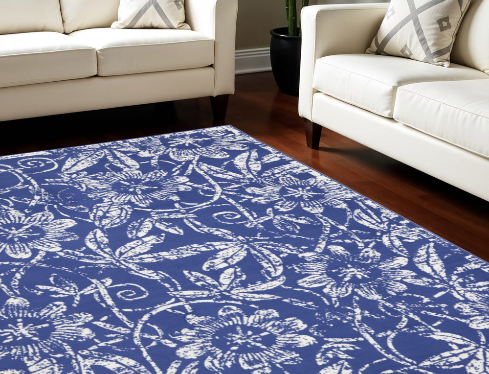 Homeroots 8' X 10' Ivory And Navy Blue Floral Distressed Non Skid Area Rug  Polypropylene 551065