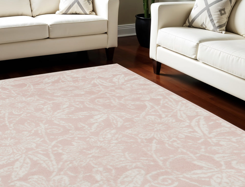 Homeroots 8' X 10' Pink And Ivory Floral Distressed Non Skid Area Rug  Polypropylene 551067