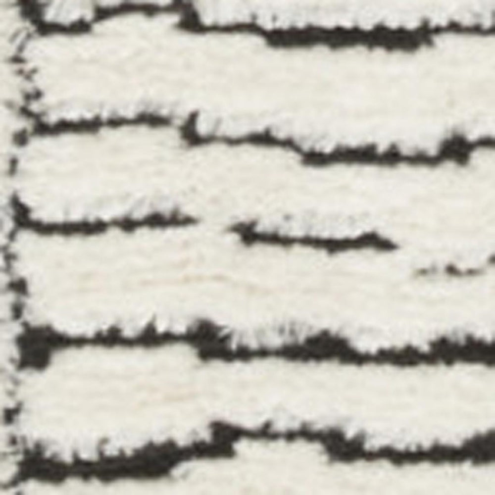 HomeRoots 5' Modern Ivory and Black Geometric Area Rug - Stylish, Durable Design for High-Traffic Spaces 8' X 10' 551080