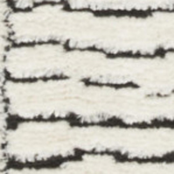 HomeRoots 5' Modern Ivory and Black Geometric Area Rug - Stylish, Durable Design for High-Traffic Spaces 8' X 10' 551080
