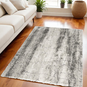 Homeroots 5' X 7' Charcoal And Ivory Abstract Shag Area Rug  Polyester 551111
