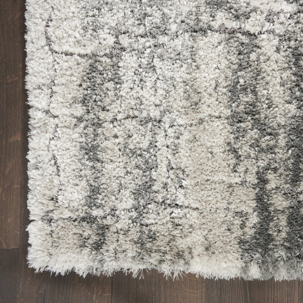 HomeRoots 5' Charcoal and Ivory Abstract Shag Area Rug - Plush, Modern Design for Cozy Living Spaces and Style 5' X 7' 551111
