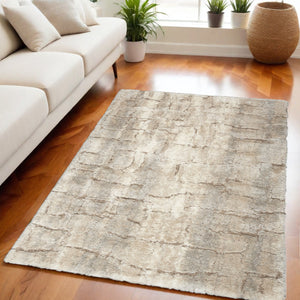 Homeroots 5' X 7' Beige And Ivory Abstract Shag Area Rug  Polyester 551113