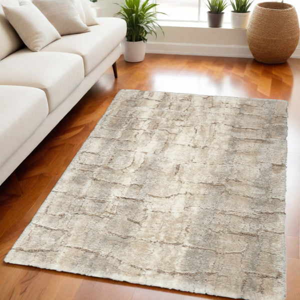 Homeroots 5' X 7' Beige And Ivory Abstract Shag Area Rug  Polyester 551113