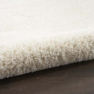 HomeRoots 4' Ivory Shag Area Rug - Luxuriously Soft, Durable & Versatile for Cozy Spaces, Kids & Pets Friendly 5' X 7' 551114