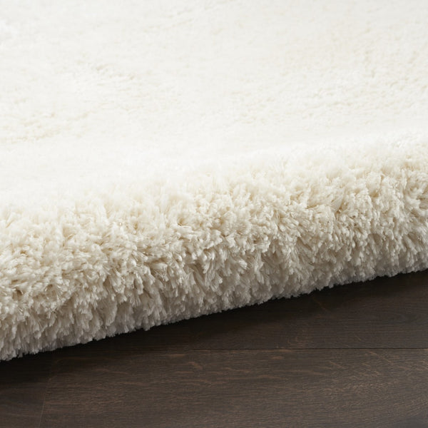 HomeRoots 4' Ivory Shag Area Rug - Luxuriously Soft, Durable & Versatile for Cozy Spaces, Kids & Pets Friendly 5' X 7' 551114