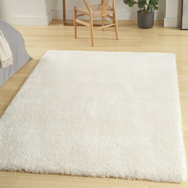 HomeRoots 4' Ivory Shag Area Rug - Luxuriously Soft, Durable & Versatile for Cozy Spaces, Kids & Pets Friendly 5' X 7' 551114