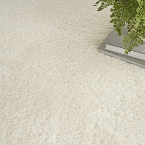 HomeRoots 4' Ivory Shag Area Rug - Luxuriously Soft, Durable & Versatile for Cozy Spaces, Kids & Pets Friendly 5' X 7' 551114