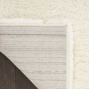 HomeRoots 4' Ivory Shag Area Rug - Luxuriously Soft, Durable & Versatile for Cozy Spaces, Kids & Pets Friendly 5' X 7' 551114