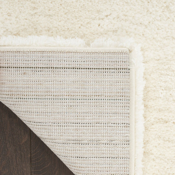 HomeRoots 4' Ivory Shag Area Rug - Luxuriously Soft, Durable & Versatile for Cozy Spaces, Kids & Pets Friendly 5' X 7' 551114