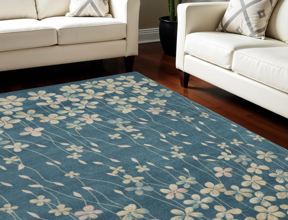Homeroots 8' Turquoise And Cream Floral Area Rug - Durable, Stain-resistant Design For Stylish Comfort And Appeal 8' X 10' Polypropylene 551139