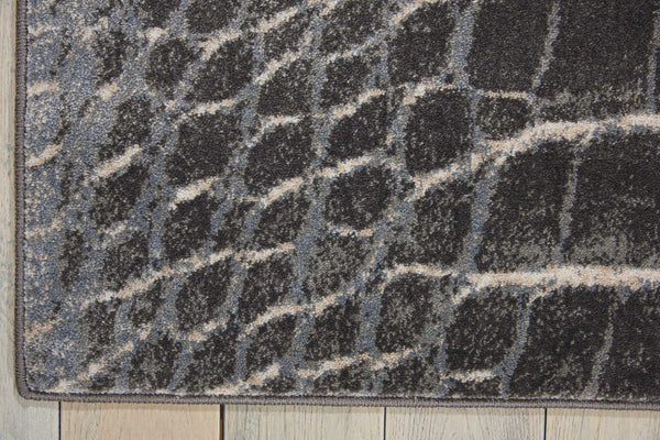 Homeroots 8' X 11' Beige Charcoal And Cream Animal Print Distressed Non Skid Area Rug  Polyester 551159