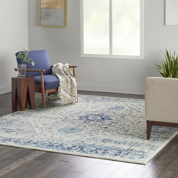 HomeRoots 8' Ivory and Light Blue Floral Medallion Distressed Area Rug - Timeless Elegance for Any Space 8' X 10' 551164