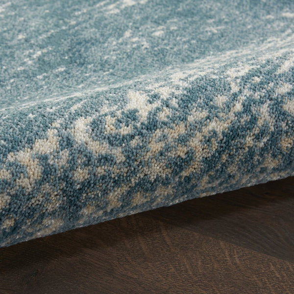 HomeRoots 5' Teal and Ivory Abstract Area Rug – Stain-Resistant, Non-Skid, Durable Design for Modern Spaces 8' X 11' 551171