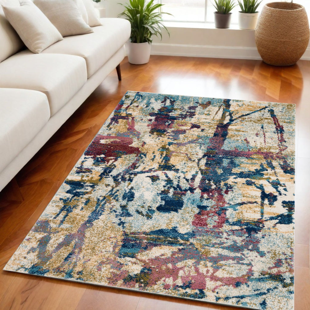 Homeroots 5' X 7' Cream Blue And Green Abstract Distressed Area Rug  Polypropylene 551182