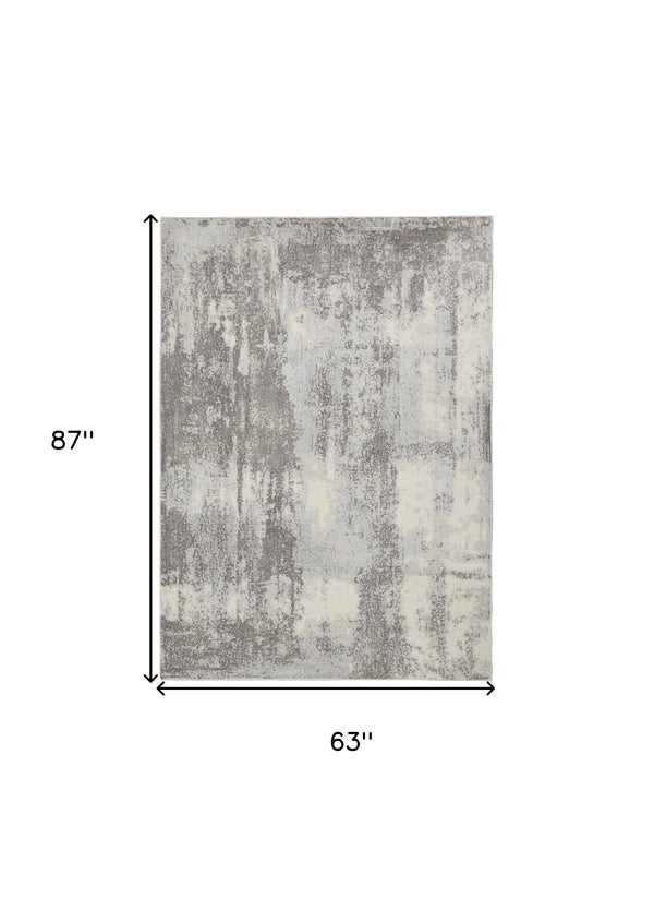 Homeroots 5' X 7' Gray Ivory And Light Blue Abstract Non Skid Area Rug  Polypropylene,Polyester 551195