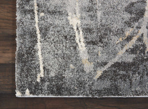 Homeroots 5' X 7' Ivory Black And Gray Abstract Distressed Area Rug  Polypropylene 551210