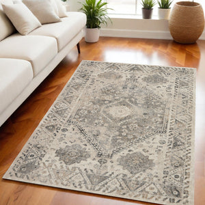Homeroots 5' X 7' Cream And Gray Floral Distressed Area Rug  Polypropylene 551211