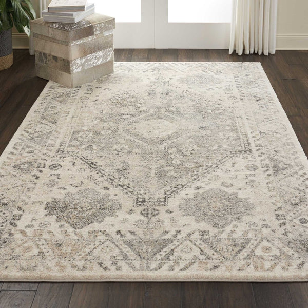 HomeRoots 5' Timeless Cream and Gray Floral Distressed Area Rug for Elegant Living Spaces and Durability 5' X 7' 551211