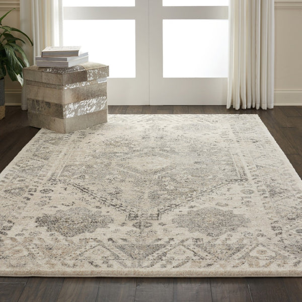 HomeRoots 5' Timeless Cream and Gray Floral Distressed Area Rug for Elegant Living Spaces and Durability 5' X 7' 551211
