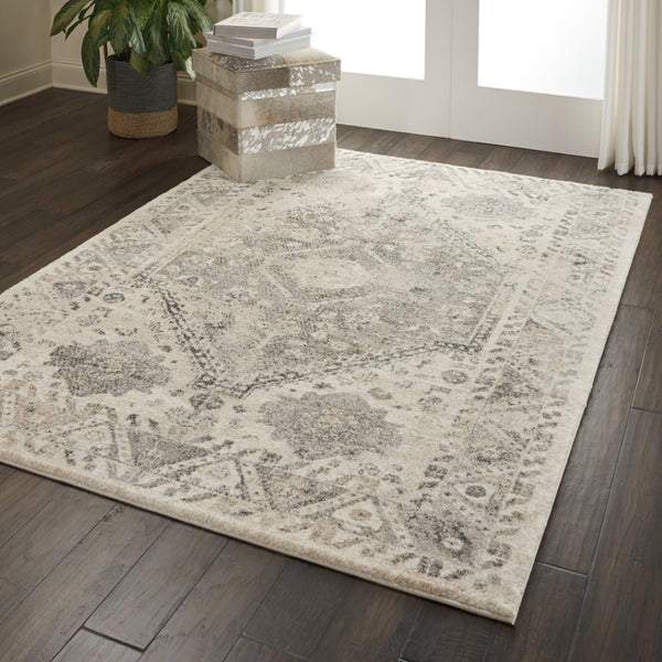 HomeRoots 5' Timeless Cream and Gray Floral Distressed Area Rug for Elegant Living Spaces and Durability 5' X 7' 551211