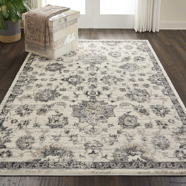 HomeRoots 4' Elegant Cream and Gray Floral Medallion Distressed Area Rug for Timeless Home Décor Appeal 5' X 7' 551212