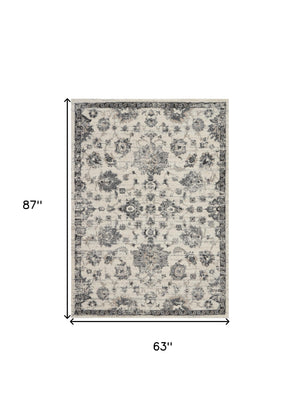 Homeroots 5' X 7' Cream And Gray Floral Distressed Area Rug  Polypropylene 551212